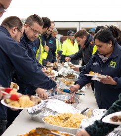 Otautahi kaimahi enjoying a hangi prepared by Kai Means Food